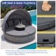 Round outdoor daybed with retractable canopy, gray PE wicker, and soft cushions for backyard relaxation.