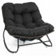 Black outdoor Papasan rocking chair with thick cushion, ergonomic design, and sturdy metal frame for comfortable.