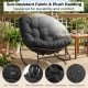 Black outdoor Papasan rocking chair with 6.5" thick cushion, sun-resistant fabric, designed for comfort and stability.