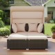 Outdoor patio rattan daybed with retractable canopy and beige cushions, perfect for backyard relaxation and sunshade.