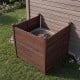 Outdoor privacy air conditioner fence made of fir wood, designed for concealing AC units in a backyard setting.