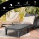 Black outdoor recliner chair with 5-position adjustable backrest, perfect for patio or poolside relaxation.