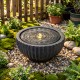 Outdoor round sphere water fountain with LED lights, featuring a realistic stone look and adjustable flow control for.