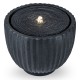 Round outdoor water fountain with pump, featuring a realistic stone look and warm white LED lights for garden ambiance.