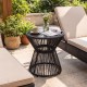 Black outdoor side table with tempered glass top and LED warm light, perfect for patio or garden use.