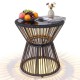 Outdoor side table with a black PE rattan base, tempered glass top, and LED warm light, perfect for patios or gardens.