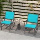 Turquoise outdoor single swing glider rocking chairs with armrests, perfect for relaxing on the patio or garden.