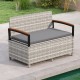 Outdoor storage bench with gray cushion, made of PE rattan and acacia wood armrests, perfect for patio or garden use.