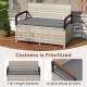 Outdoor storage bench with gray cushion, acacia wood armrests, and PE rattan for patio or garden use.