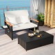 Outdoor wicker daybed with plush white cushions and wooden armrests, ideal for comfortable patio lounging and.
