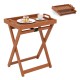 Portable outdoor wood tray table with folding frame, featuring side handles and a rustic finish, ideal for patio use.