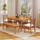 Outdoor wooden dining table made of acacia wood, featuring a wide tabletop and built-in umbrella hole, perfect for.