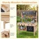Outdoor mud kitchen for kids featuring wooden construction, blackboards, and ample storage for imaginative play.