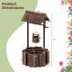 Outdoor wooden wishing well planter with rustic burnt-like finish, featuring a bucket for smaller plants, dimensions.