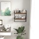 Wall-mounted over the toilet shelf with metal frame and two open storage shelves, ideal for bathroom organization.
