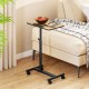 Overbed rolling food tray table with adjustable height and 360° rotating tabletop, perfect for meals or laptop use.