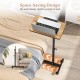 Overbed rolling food tray table with adjustable height, 360° rotating surface, and space-saving design for versatile.