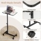 Gray overbed rolling table with adjustable height, 360° rotating tabletop, and sturdy metal frame for versatile use.