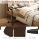Overbed table with a walnut wood-like surface, lockable rolling wheels, and a sturdy H-shaped base for versatile use.