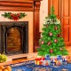 2 ft artificial Christmas tree with PVC branches, burlap base, and gifts, perfect for holiday decor in any space.