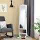 White mirrored jewelry cabinet armoire with tilting feature, showcasing a full-size mirror and elegant design for.