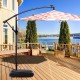 Water-filled patio umbrella base made of heavy-duty HDPE plastic, designed for stability in windy conditions.