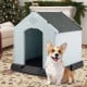 Small dog house made of waterproof plastic with elevated floor, providing comfort and protection from the elements.