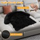 Plush calming dog couch bed with anti-slip bottom, designed for stability and comfort on furniture or in the car.