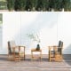 Two chairs with gray cushions and a coffee table made of acacia wood, perfect for outdoor patio relaxation.