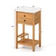 Acacia wood patio storage cabinet with faux marble top, featuring two drawers and wine holders for outdoor organization.
