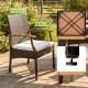 Patio dining chair with ergonomic backrest, curved armrests, and soft zippered cushion, ideal for outdoor relaxation.