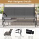 Patio glider bench in grey with curved teak armrests and breathable fabric seat, ideal for backyard relaxation.