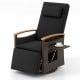 Black patio rattan 360° swivel recliner chair with adjustable backrest, footrest, and foldable side table for outdoor.