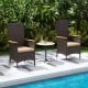 High-back patio rattan chairs with beige cushions, set by the poolside for outdoor dining and relaxation.