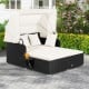 Patio rattan daybed with retractable canopy and side tables in off-white, perfect for backyard relaxation.