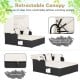 Patio rattan daybed with retractable canopy, off-white cushions, and side tables for comfortable outdoor relaxation.