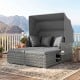 Patio rattan daybed with retractable canopy and soft cushions, perfect for outdoor relaxation by the poolside.