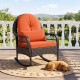 Patio rattan rocking chair with red cushions, featuring ergonomic design and durable PE rattan, perfect for outdoor relaxation.