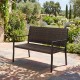 Brown rattan loveseat with soft sponge seat, sturdy metal frame, perfect for outdoor patio relaxation.