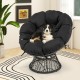 Overstuffed black PE wicker papasan chair with thick cushion, perfect for indoor or outdoor relaxation.