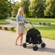 Pet stroller for small to medium dogs in black, featuring a foldable design and breathable mesh windows for comfort.
