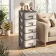 Gray plastic storage organizer with compact drawers, ideal for bedroom use, featuring easy-pull handles and a spacious.