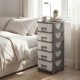 Gray plastic storage organizer with compact drawers, perfect as a bedside table for maximizing space and easy access.