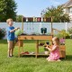 Wooden play kitchen for kids featuring a sink, stoves, and planter boxes, perfect for imaginative outdoor play.
