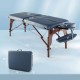 Portable folding massage table in navy with adjustable height, solid beech wood frame, and included carrying case for.