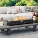 Portable mini fireplace with stainless steel burner and wind guard, perfect for outdoor table use and warmth.