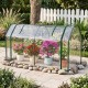 Portable mini greenhouse with PE cover and zippered door, ideal for protecting plants in the backyard or garden.