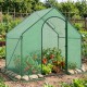 Portable outdoor warm house with PE cover, showcasing a roll-up zippered door and secure stone weight for stability.