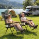 Portable zero gravity chairs in gray with cup holder trays, perfect for outdoor relaxation by the lake.