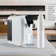 Countertop reverse osmosis system with a filter replacement, featuring a twist-in design for easy installation and pure.